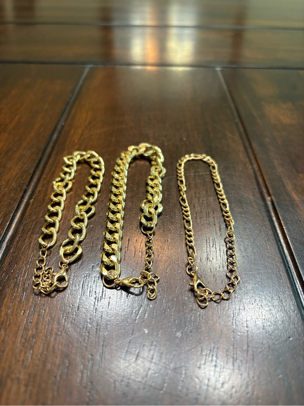 Bundle of 3 gold tone chain bracelets
